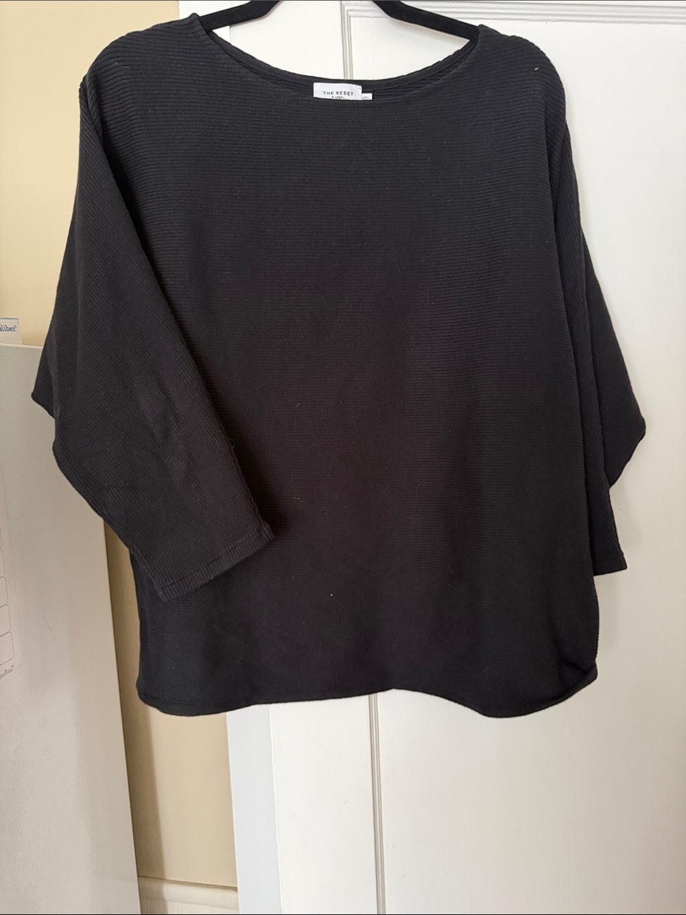 The Row Black Relaxed Ribbed Crewneck Sweater